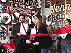 Jenny Zamora cuts the ribbon officially launching her new Panorama City business, Jenny’s Dog Grooming