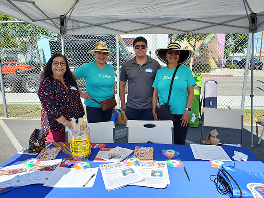 Pictured with Bella Entrepreneurs staff, East LA BusinessSource Program Director Irma Vargas (pictured far left), and Pico-Union BSC Business/Loan Counselor Ivan Vasquez (pictured second from right)