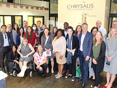 California Labor Secretary Natalie Palugyai (first row, third from left) recently visited LA:RISE partner Chrysalis to learn more about how the program helps individuals with high barriers to employment enter the workforce