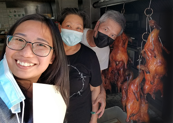 Hollywood BusinessSource Center business coach Elaine Pang (left) with Ling Ling BBQ Fast Food owner CuiLing Qiu (center) and her husband