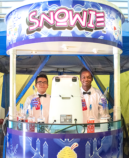 (left to right) Local LA entrepreneurial teens Axel and Sincere started their own Snowie! franchise - a Hawaiian shaved ice business