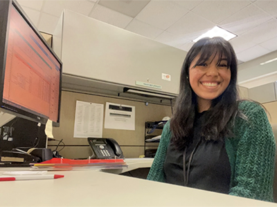Destiny Pineda at her full-time job as a Housing Support Specialist with HACLA