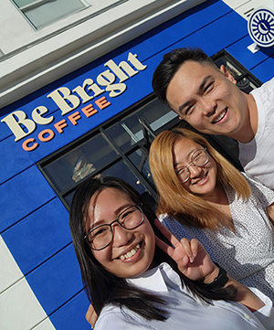 Owner of Be Bright Coffee, Frank La (far left) with his family