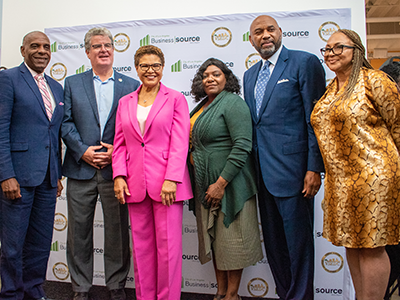 August 10, 2023 - Watts BusinessSource Center grand opening; CD15 Councilmember Tim McOsker (second from left), LA City Mayor Karen Bass (third from left), and EWDD General Manager Carolyn Hull (center)