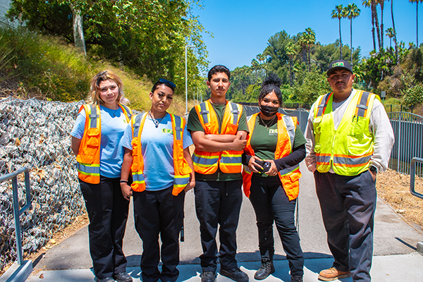 five of the 2023 participants in the LA River Rangers program through the LA Conservation Corps, including Genesis (far left) and Jennifer (second from left)