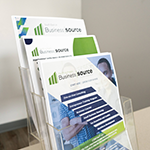 Stacks of BusinessSource flyers